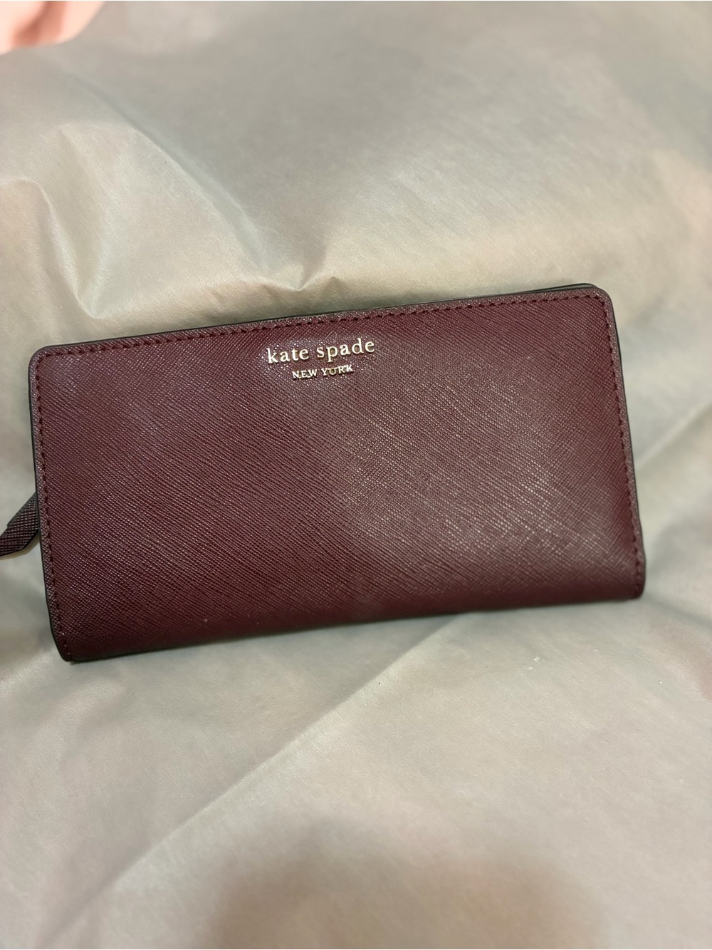 kate spade Burgundy Saffiano Leather Wallet with Gold Logo